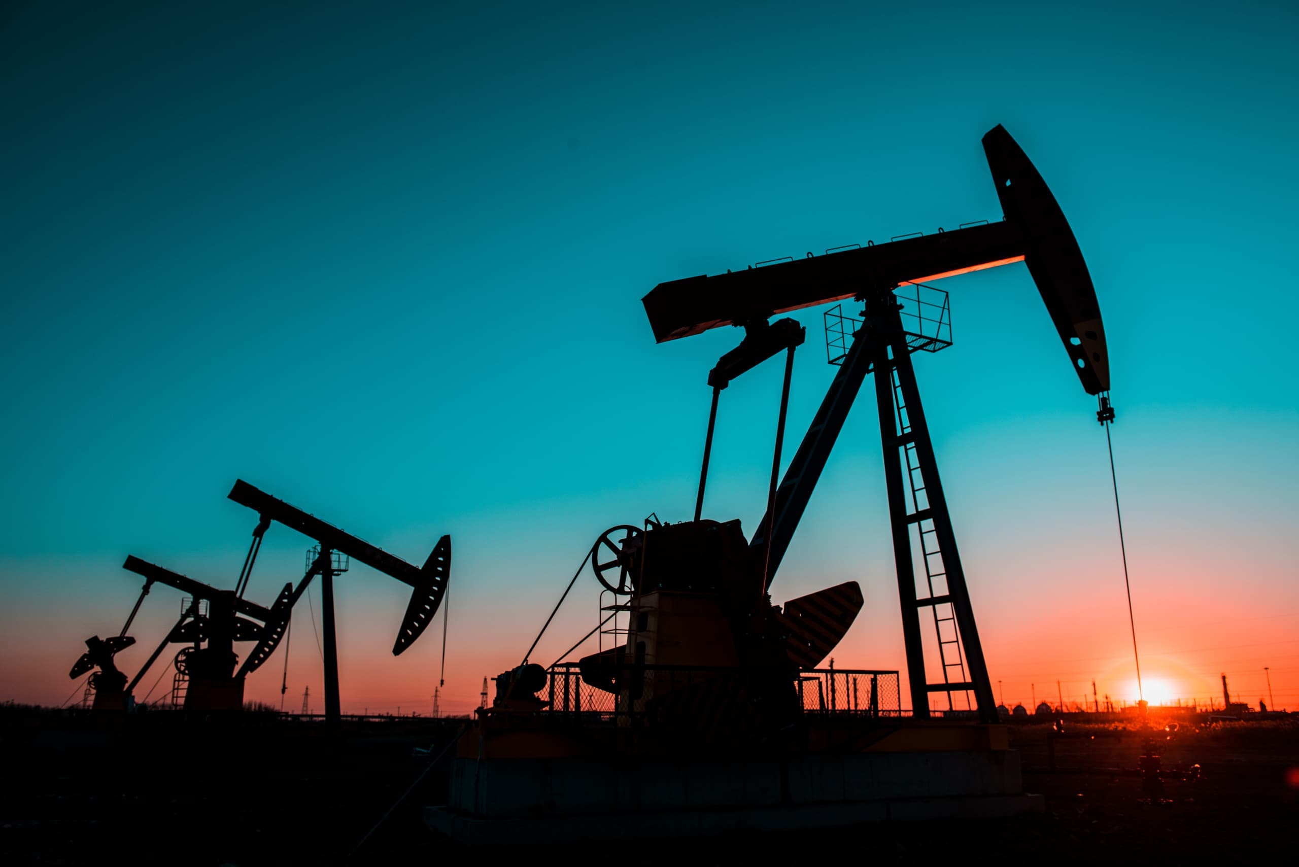Pumpjacks at sunset in the field